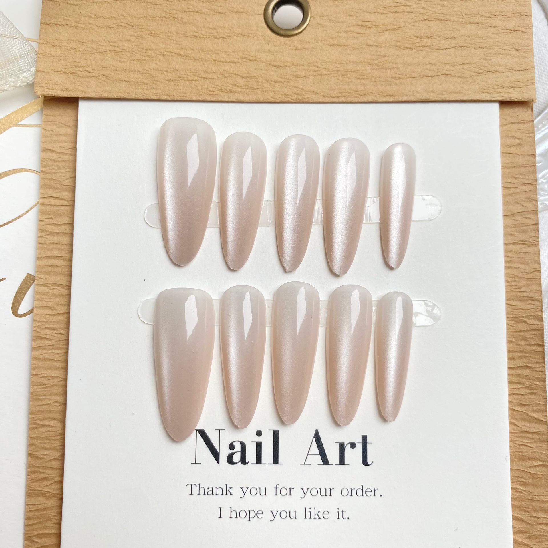Nude Pink Almond · Long press-on nail sample